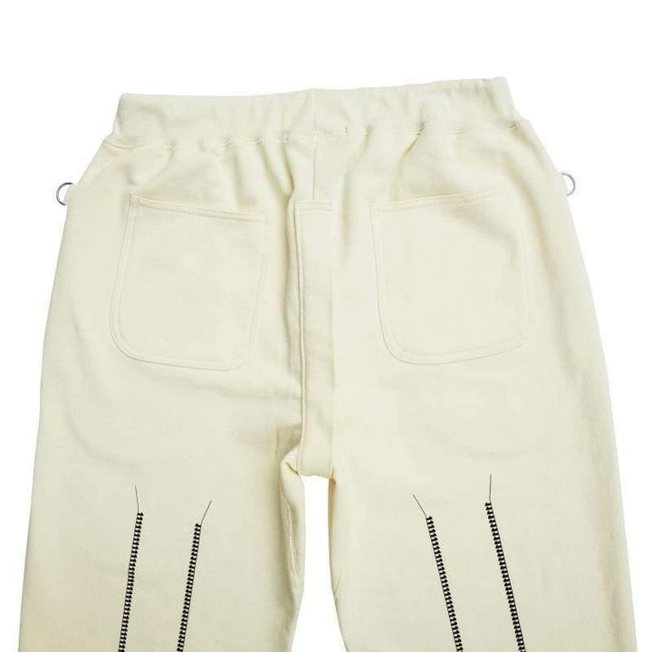 Original John(オリジナル ジョン) | ボンテージパンツのデザインを取り入れたスウェットパンツ〈Ivory〉 - Sopwith camel